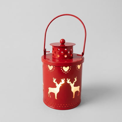 Havenlia Nordic wrought iron LED flameless candle lantern glowing on mantel