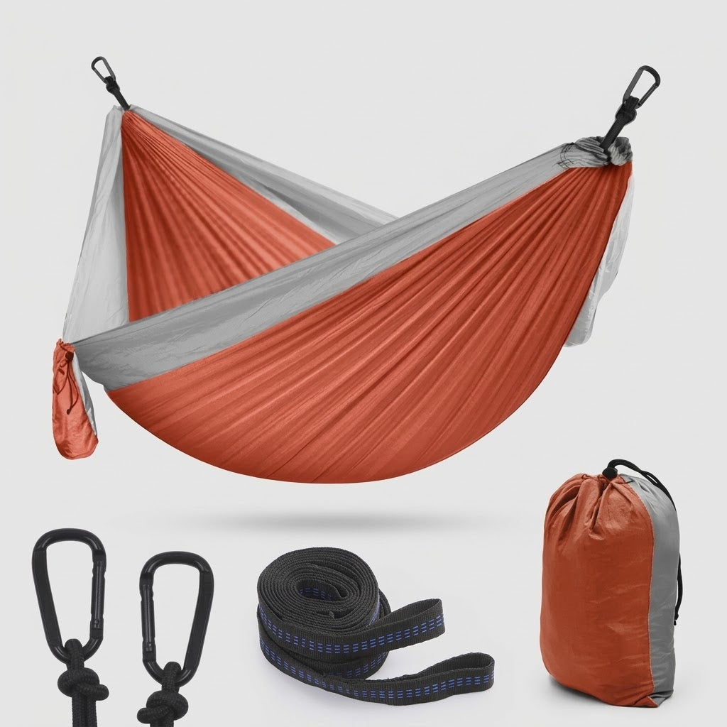 Havenlia double camping hammock with tree straps hung between two trees