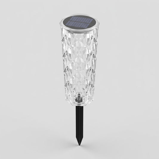 Havenlia solar rose garden stake light glowing in flower bed at dusk