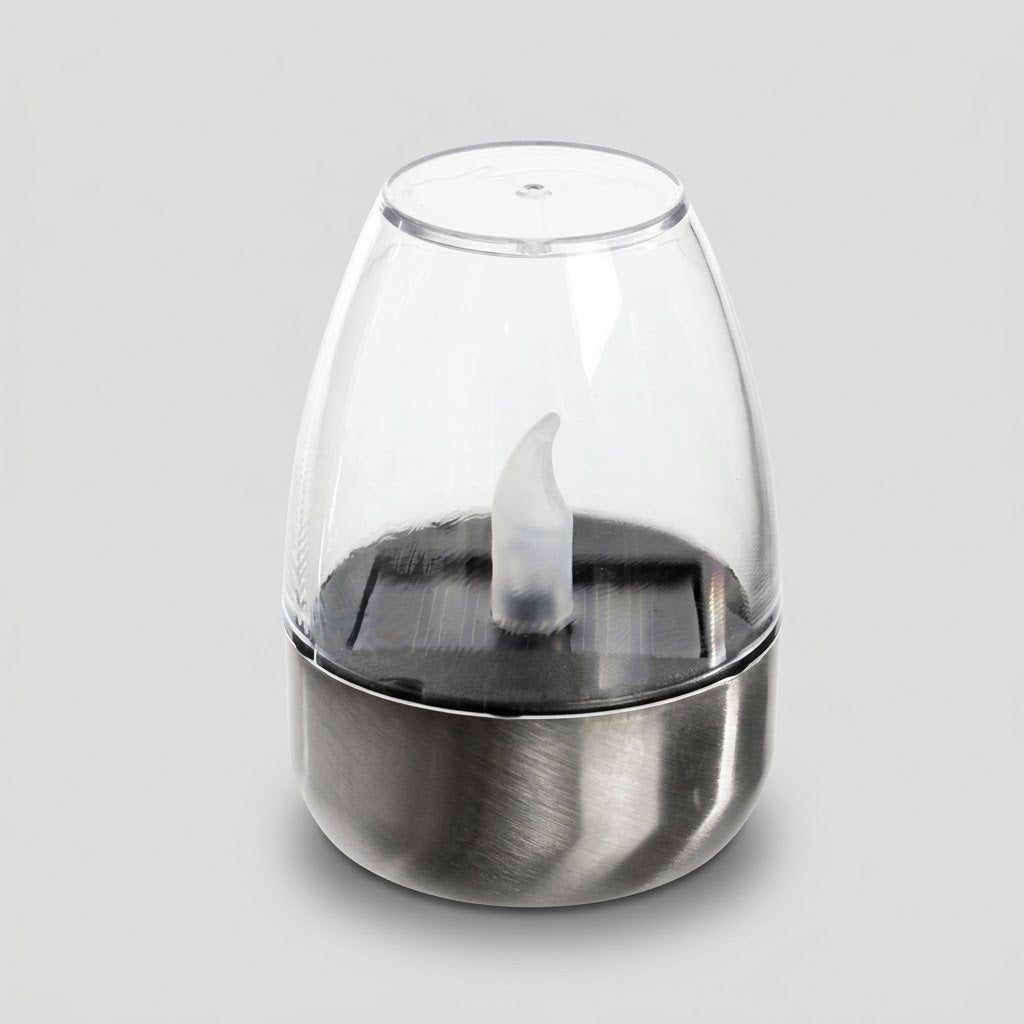 Havenlia solar warm glow garden candle lamp glowing on pathway at dusk